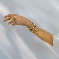 Breites goldenes Bienenarmband