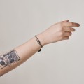 Doppeltes, dunkles Armband mit einer Tablette aus der Pills-Kollektion PA25-3 ORSKA