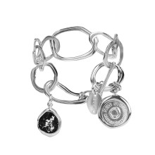 Silberarmband mit unregelmäßigen Gliedern und neuem Stein