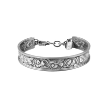 Ein steifes, handverziertes Armband aus der Nepal Kollektion