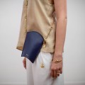 Kleeblatt-Anhänger an der GOJI-Tasche aus der VIVO-Kollektion - ORSKA Kunstschmuck